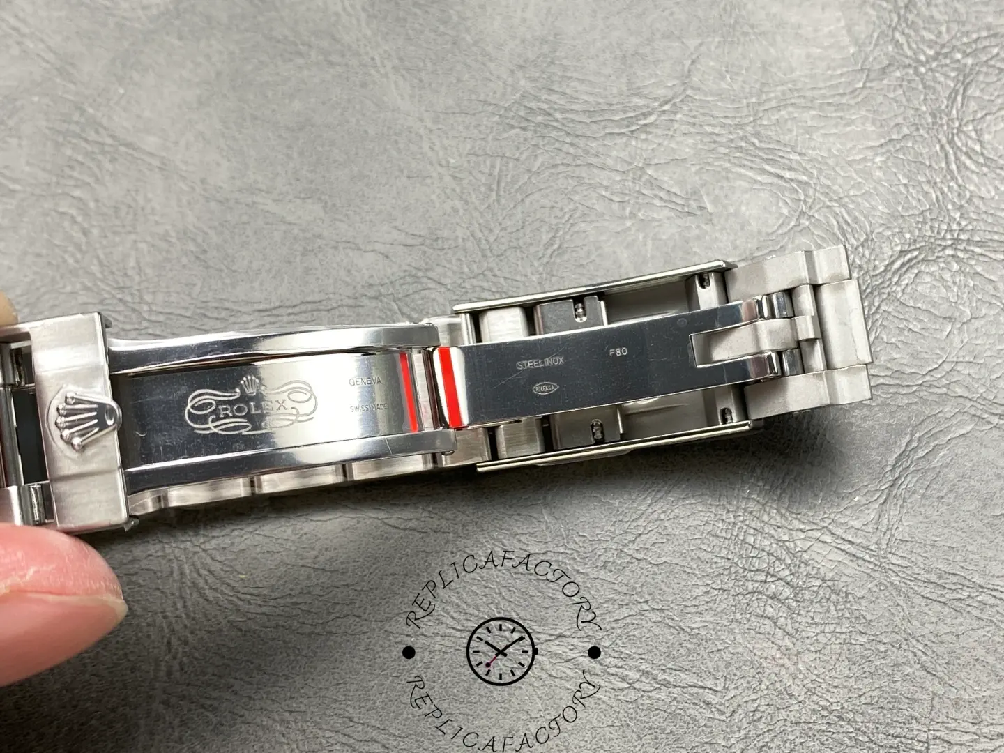 Rolex Submariner 124060, open clasp and bracelet links detail.