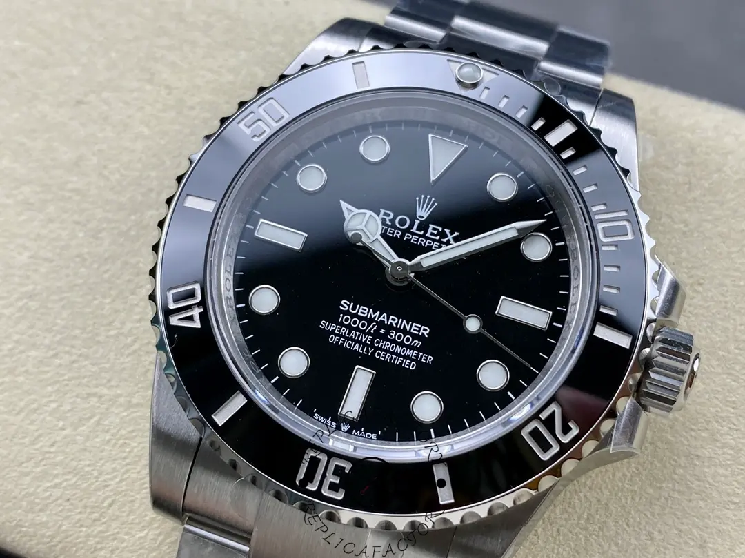 Rolex Submariner 124060, angled dial macro with bezel edge visible.