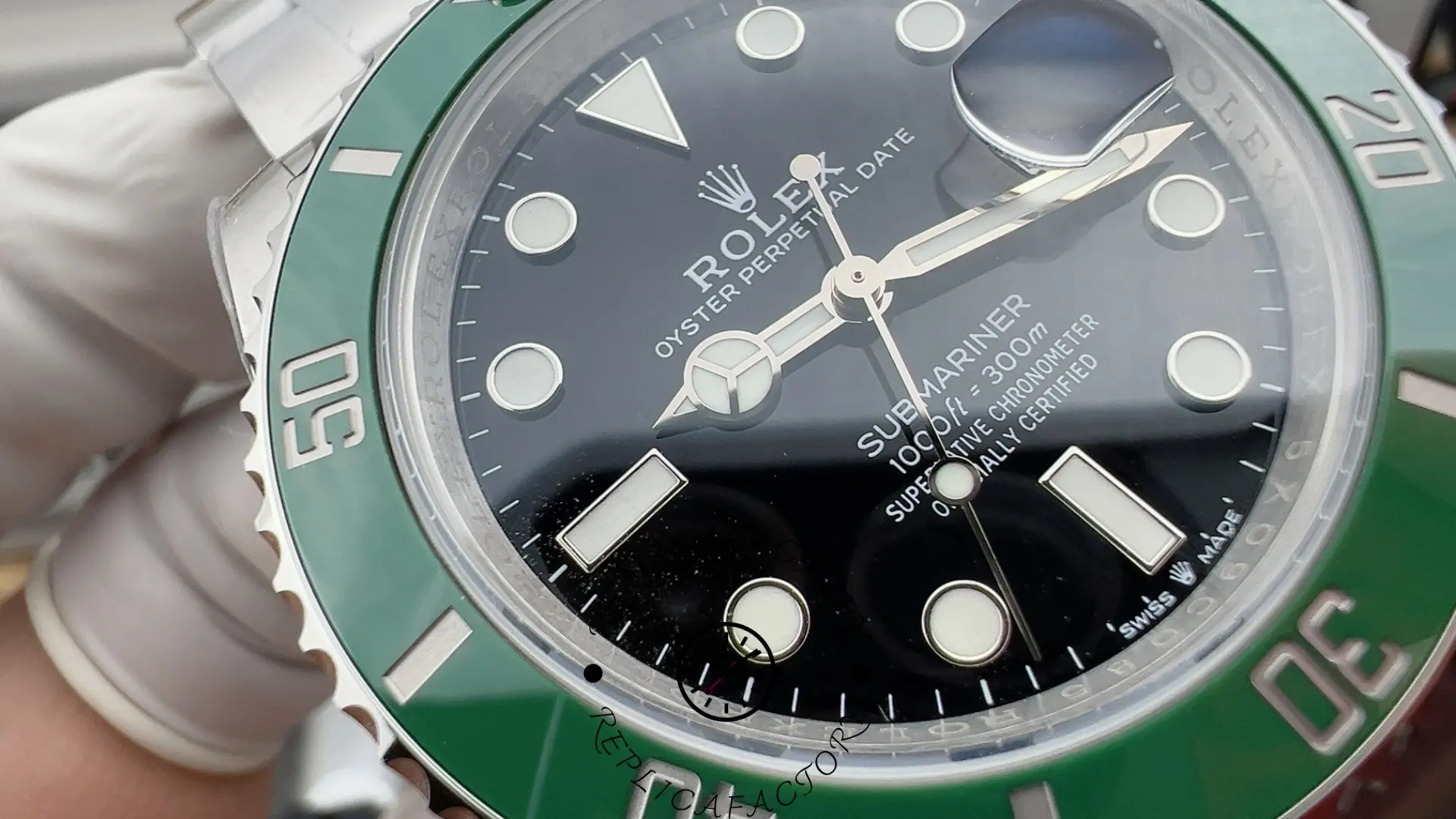 Rolex Submariner 126610LV, macro shot of black dial with luminous hour markers and cyclops date.