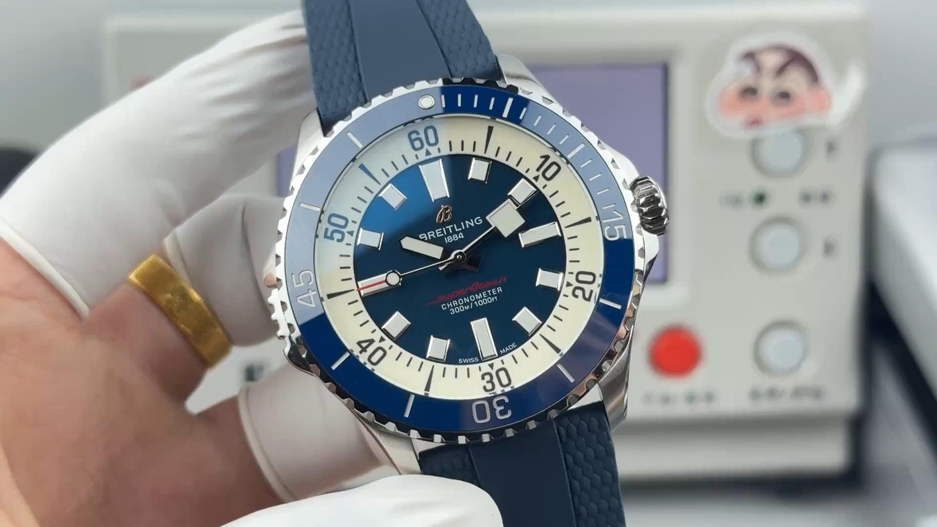 Front view of Breitling Superocean A17378211B1S1 with blue dial and rubber strap, studio background. - Video