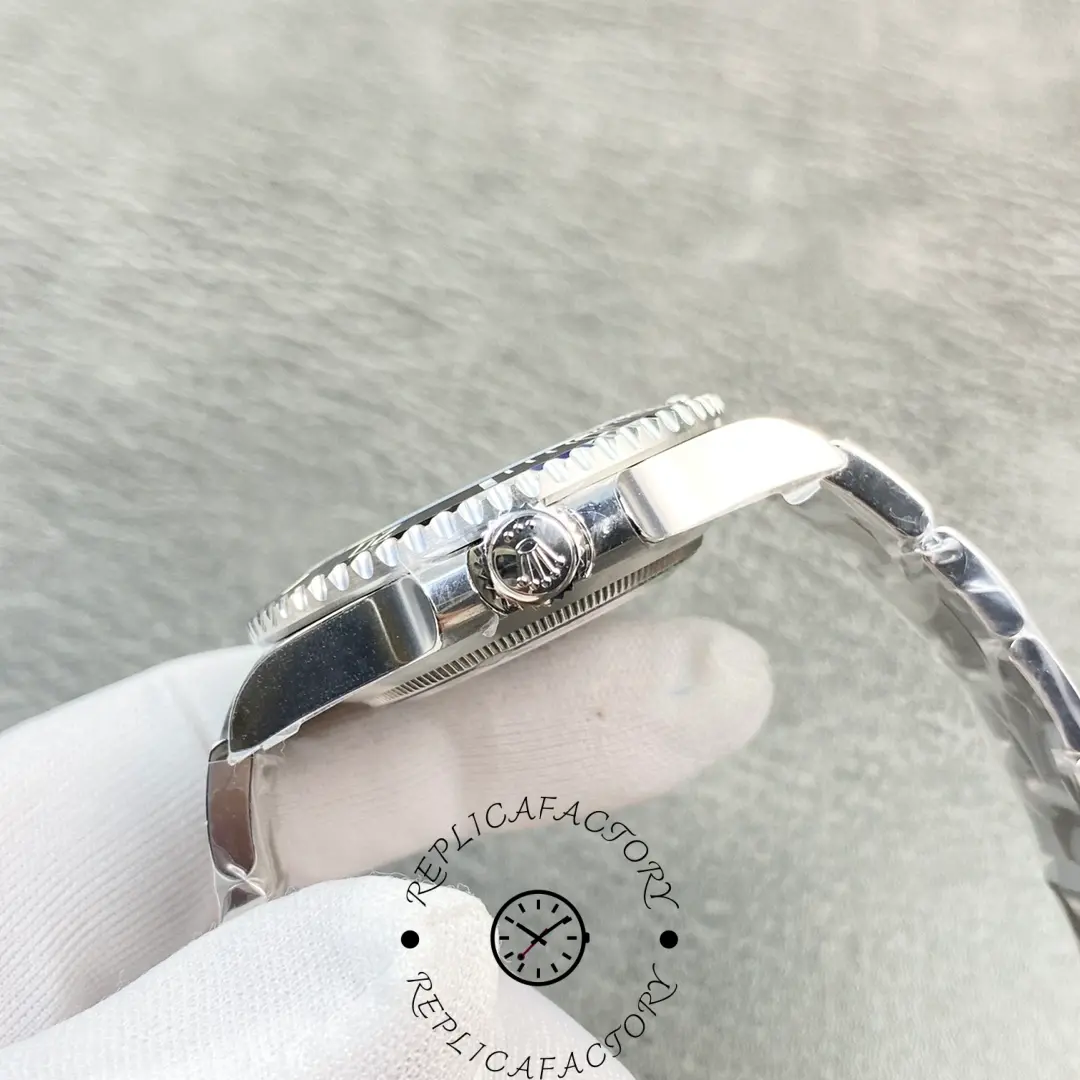 Rolex Submariner 114060, three-quarter view focusing on the crown guards and bezel insert.
