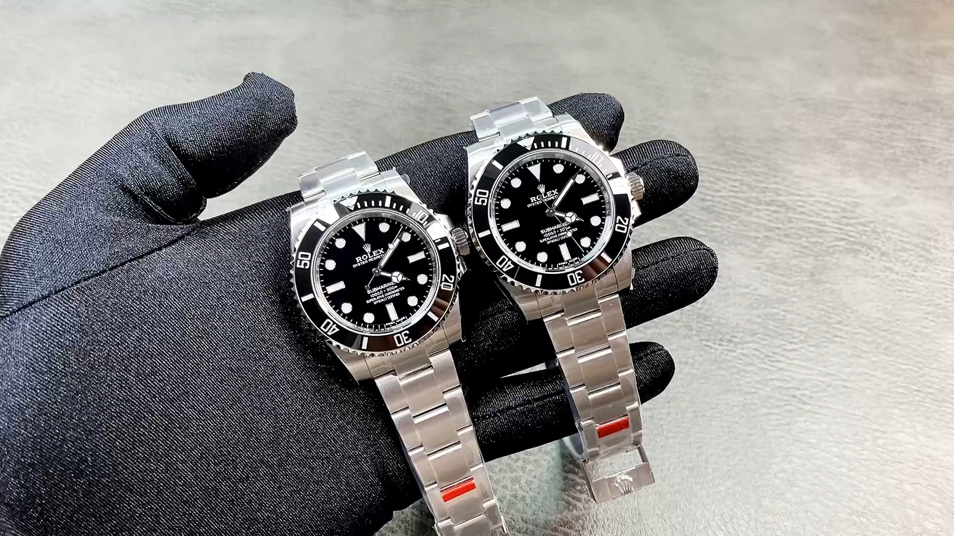 Rolex Submariner 114060, hand-held shot highlighting the no-date black dial and luminous markers. - Video