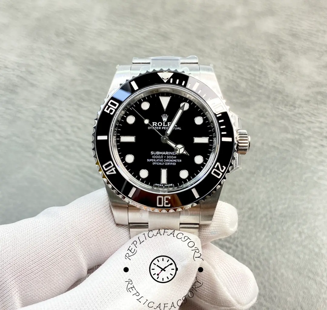 Rolex Submariner 114060, close view on glove showing bezel numerals and Mercedes hour hand.