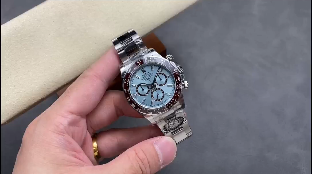 Hand-held view of the Rolex Platinum Cosmograph Daytona 126506 0002, ice blue dial visible. - Video