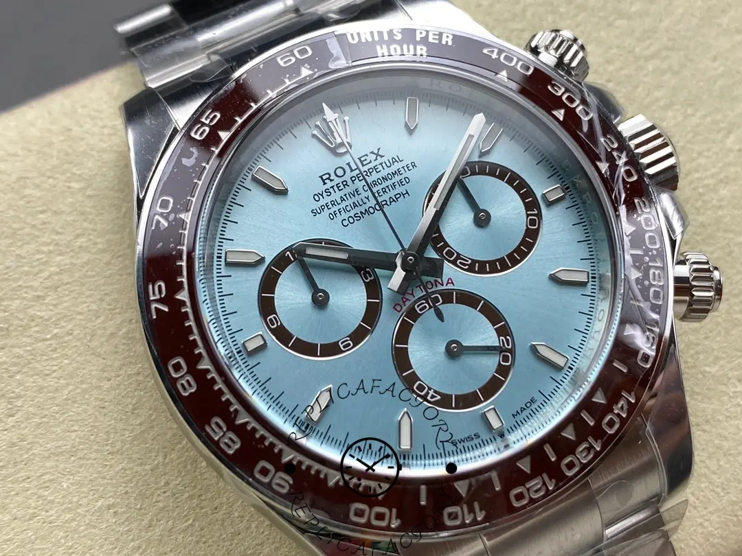 Close-up of Rolex Platinum Daytona 126506, ice blue dial and brown bezel details.