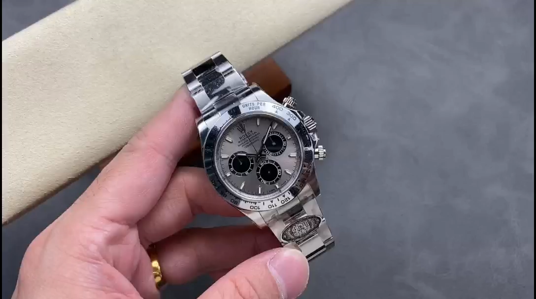 Rolex Daytona 126509-0003 video, handheld view of silver dial and bezel. - Video