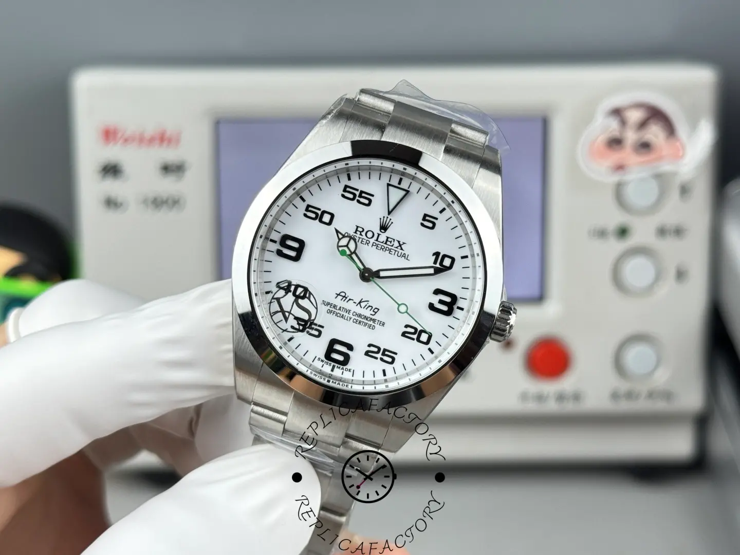 Rolex Air-King 126900 angled view, white dial, Oyster bracelet, crown side.