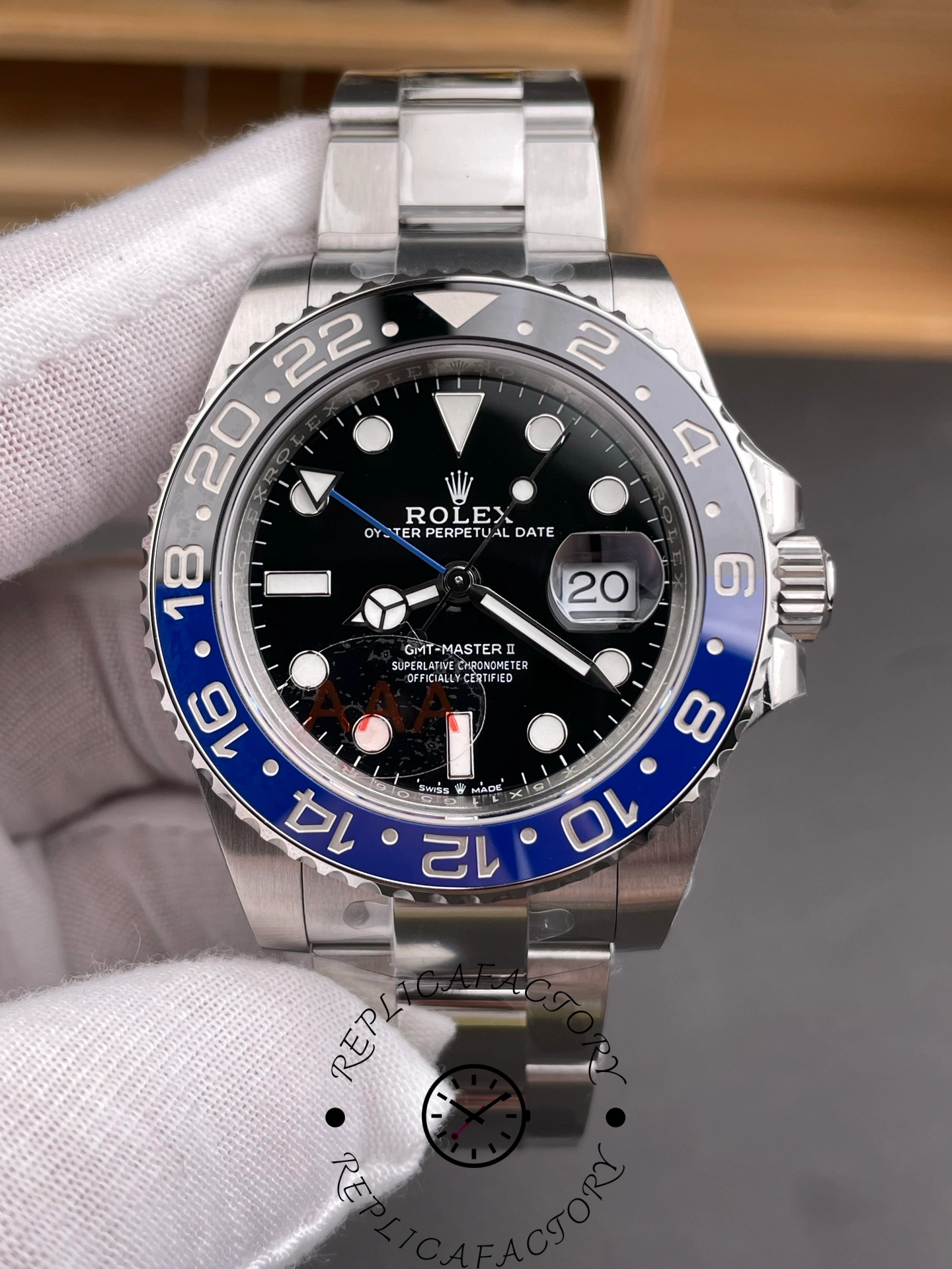 Rolex GMT-Master II 126710BLNR 0003 close front view, black dial details, blue-black bezel.