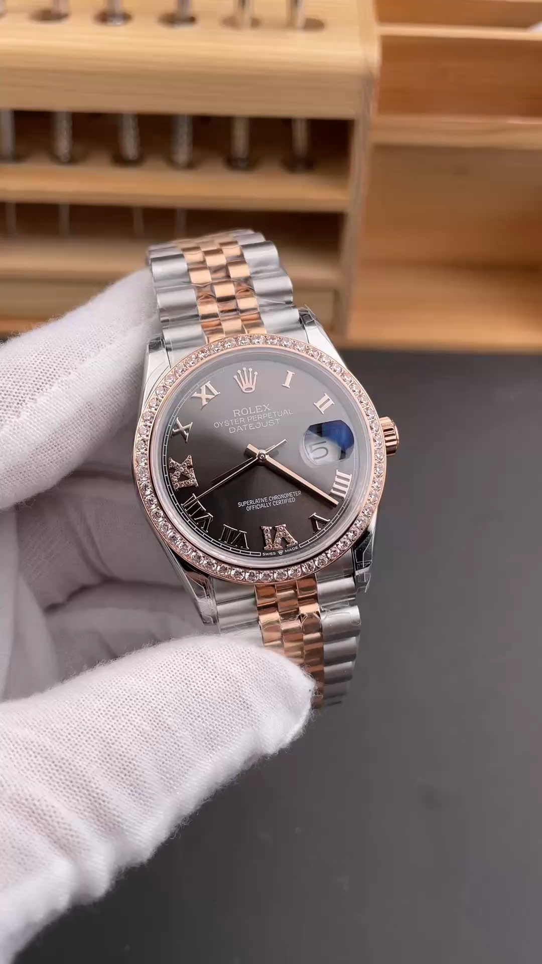 Hand-held front view of Rolex 126281RBR-0011 with chocolate dial, shown in video. - Video