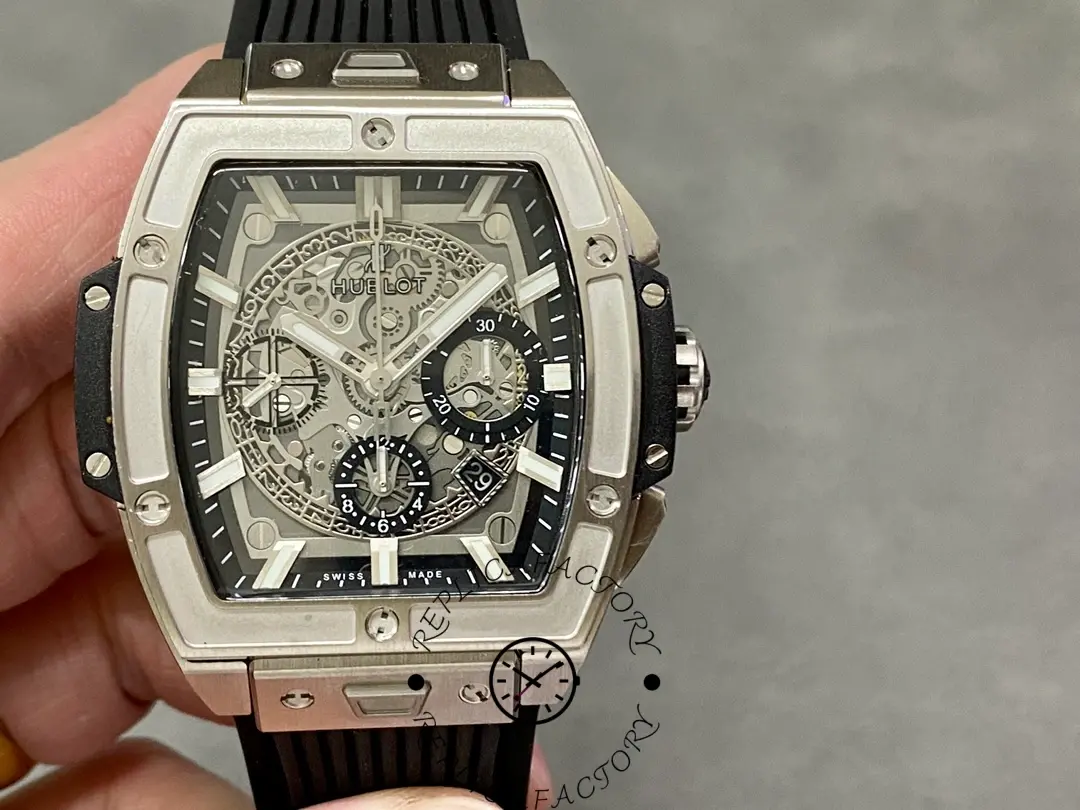 Handheld front view of Hublot Spirit of Big Bang 642.NX.0170.RX showing titanium case and skeleton dial.