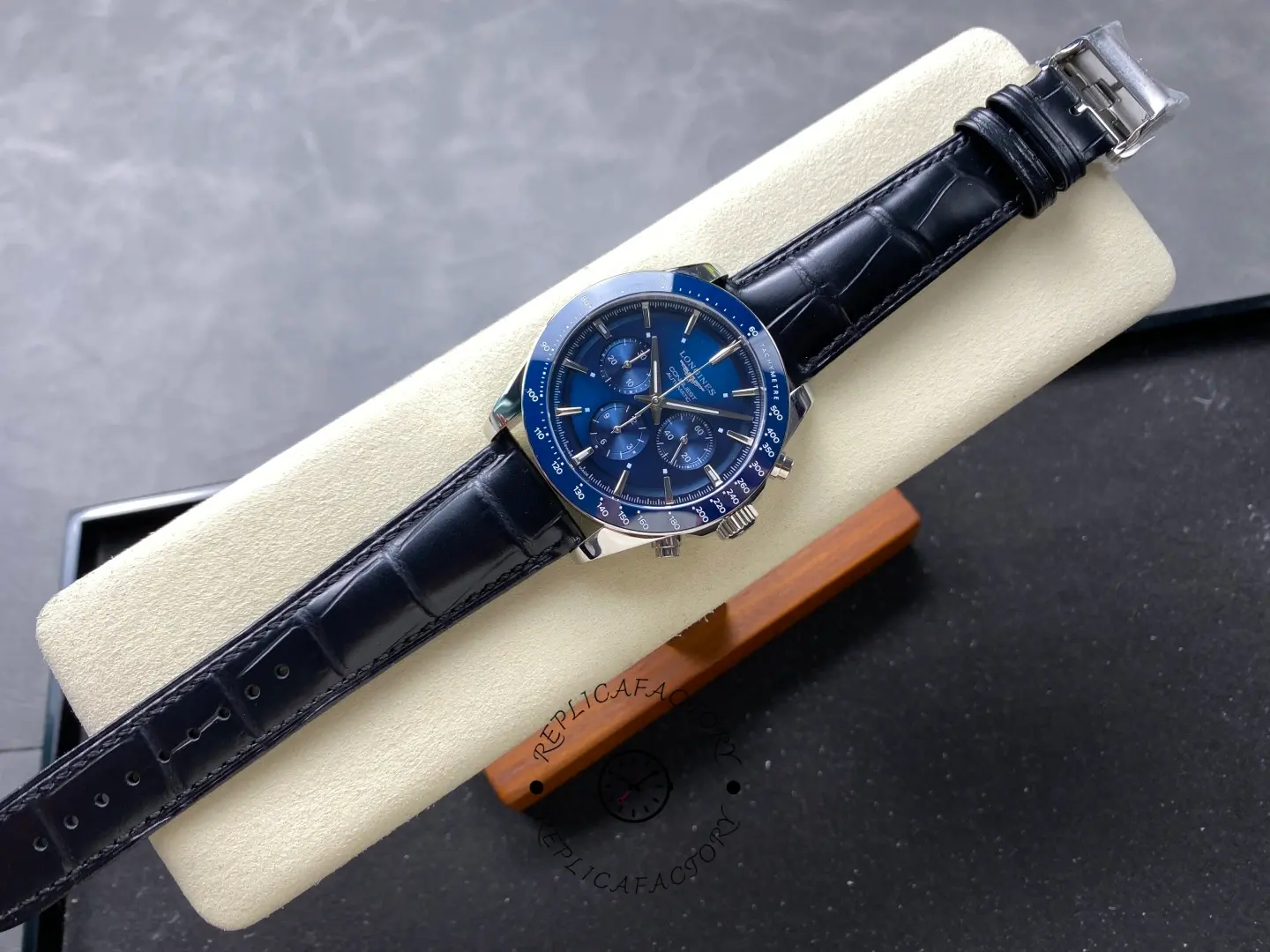 Full view of the Longines Conquest L3.835.4.92.6 with blue dial and leather strap.