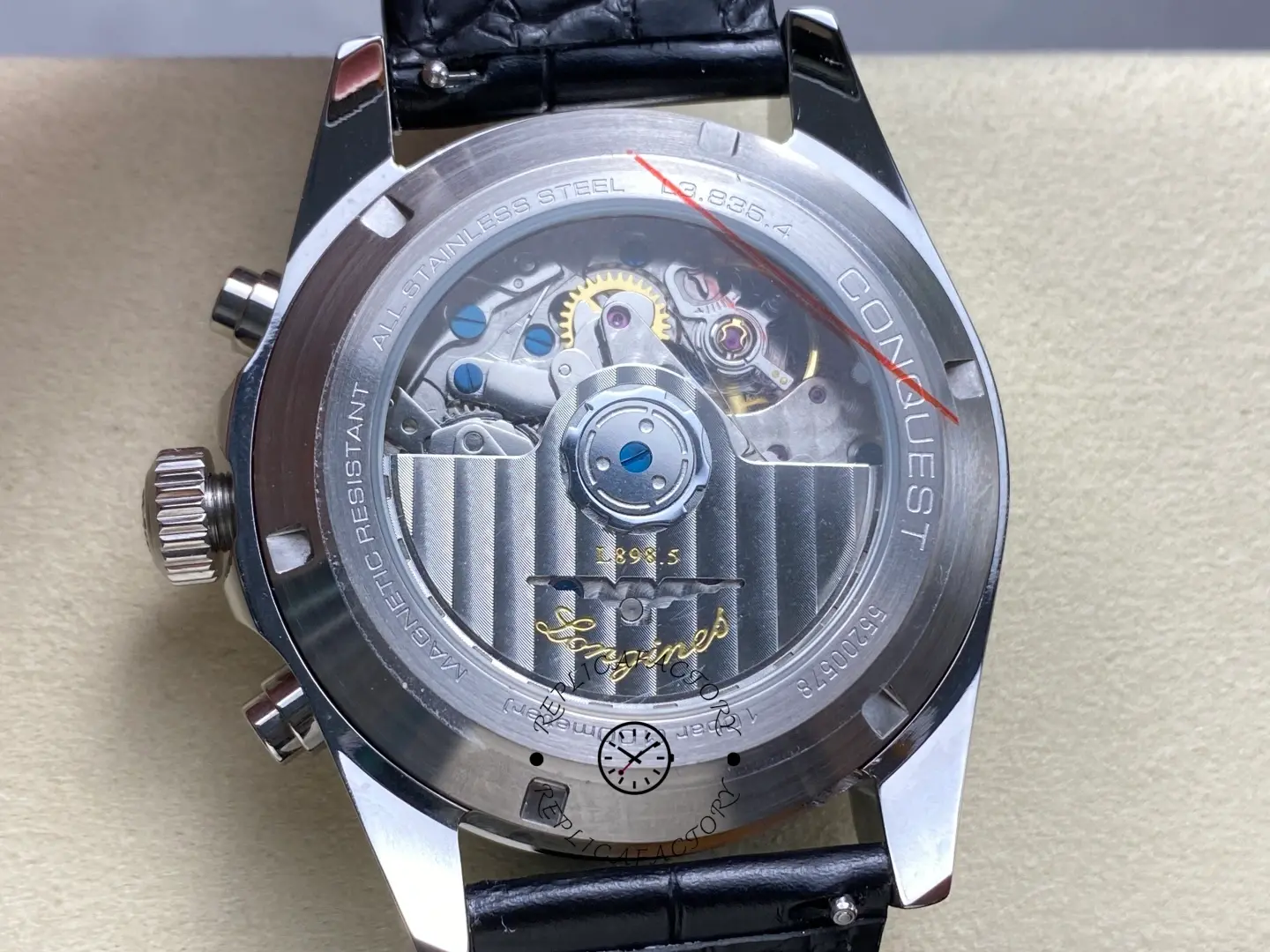 Caseback view of Longines Conquest L3.835.4.52.6 showing automatic movement and engraving.