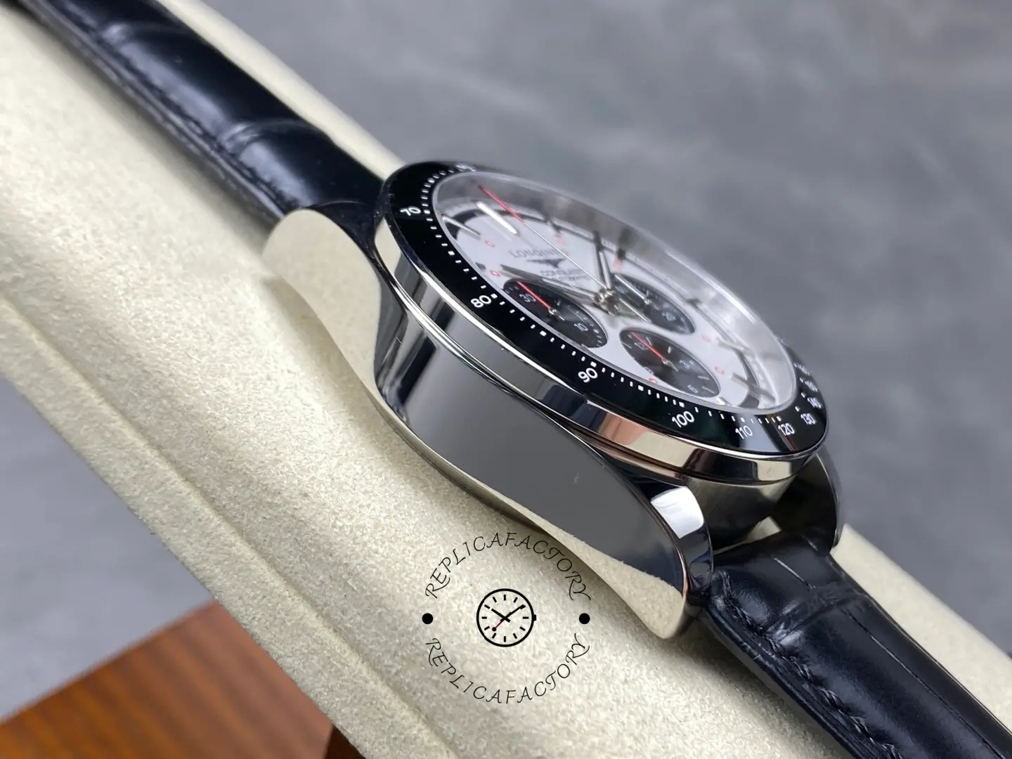 Longines Conquest Chronograph L3.835.4.72.6, side view showing polished case and black bezel.