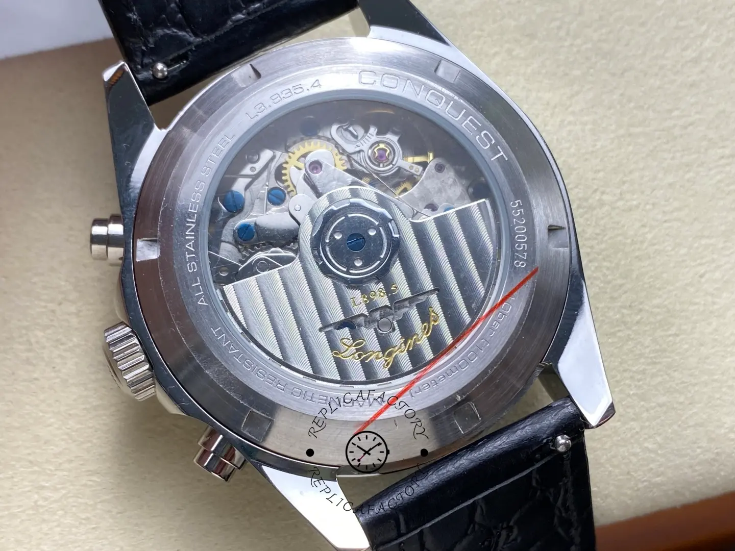 Caseback view of Longines Conquest L3.835.4.91.2 showing automatic movement and engraved rotor.