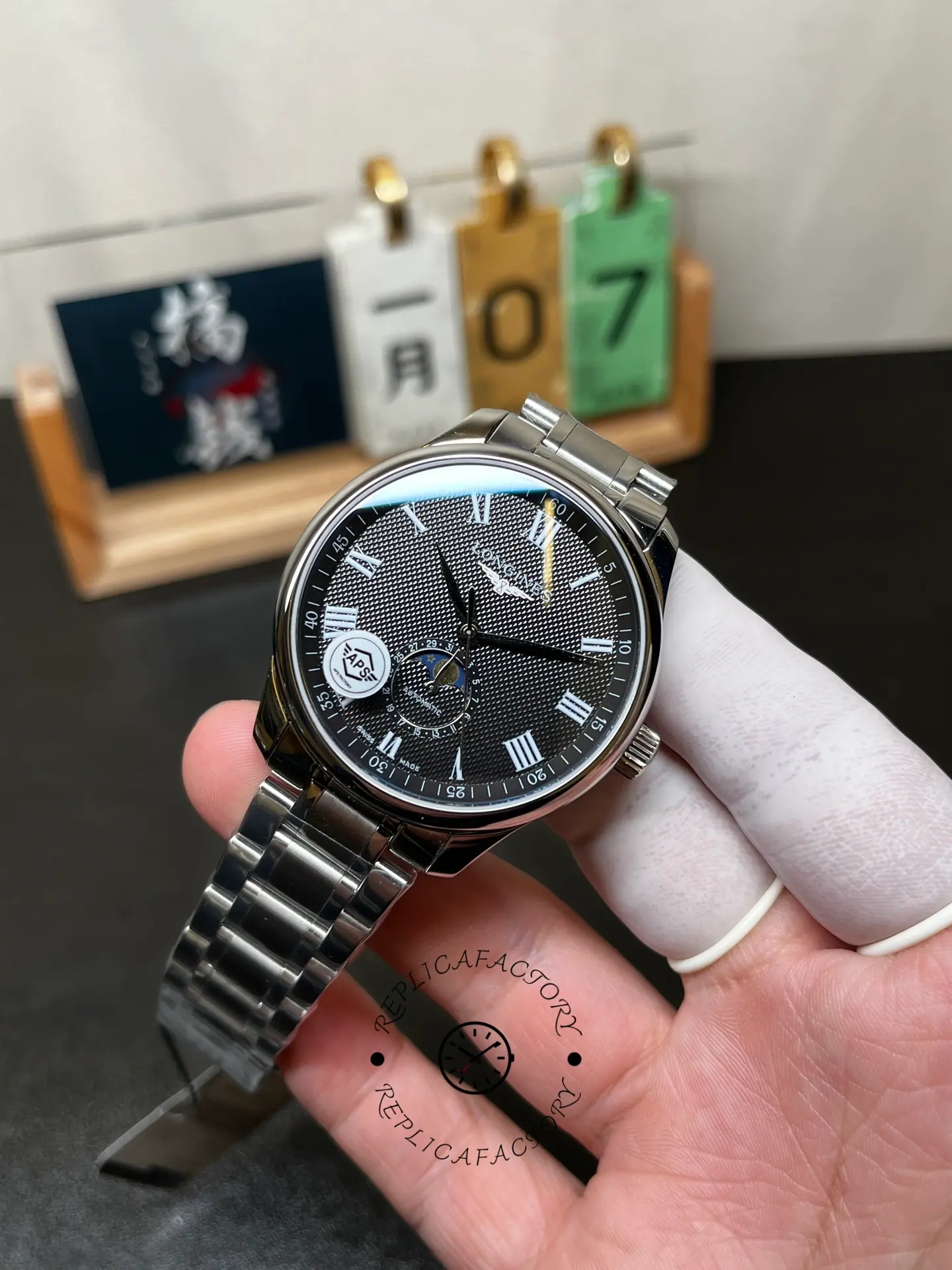 Longines Master Collection L2.919.4.51.6, full front view of black Roman dial and moonphase subdial.