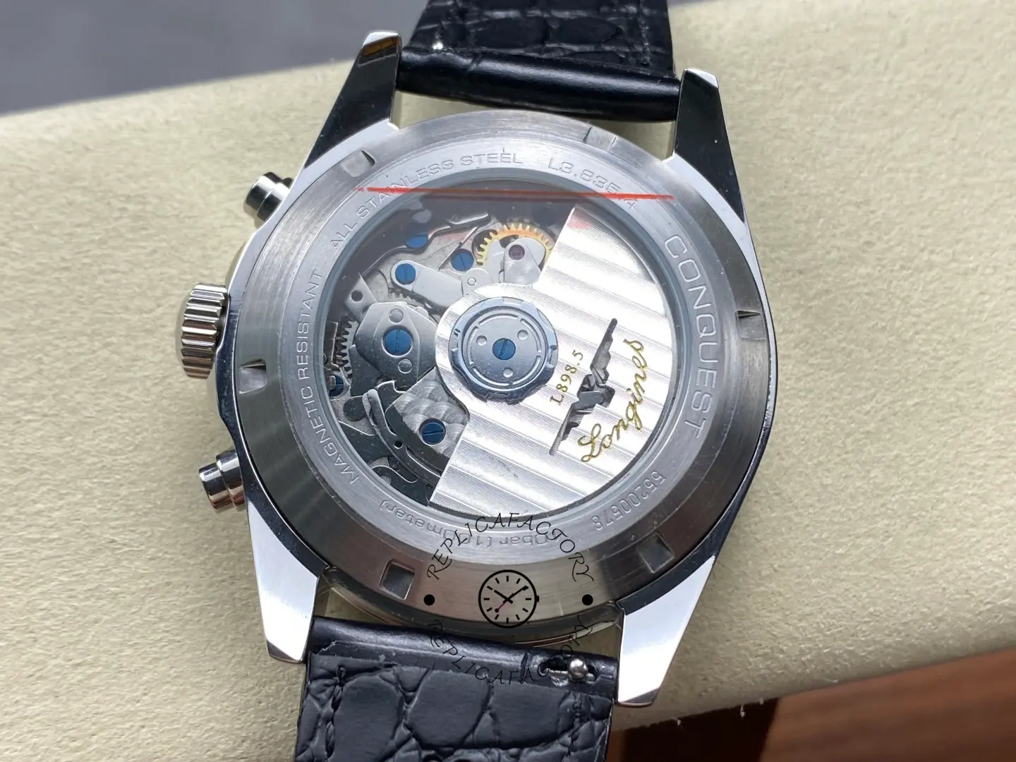 Caseback of Longines Conquest L3.836.4.52.9 showing automatic movement and engraving.