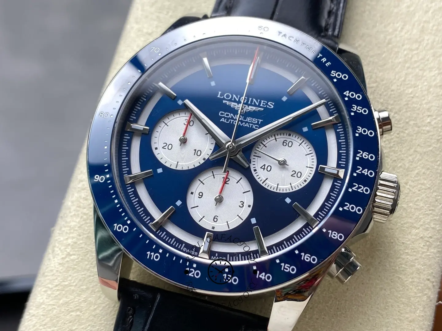 Longines Conquest L3.835.4.91.2 close-up of blue dial and white chronograph subdials.