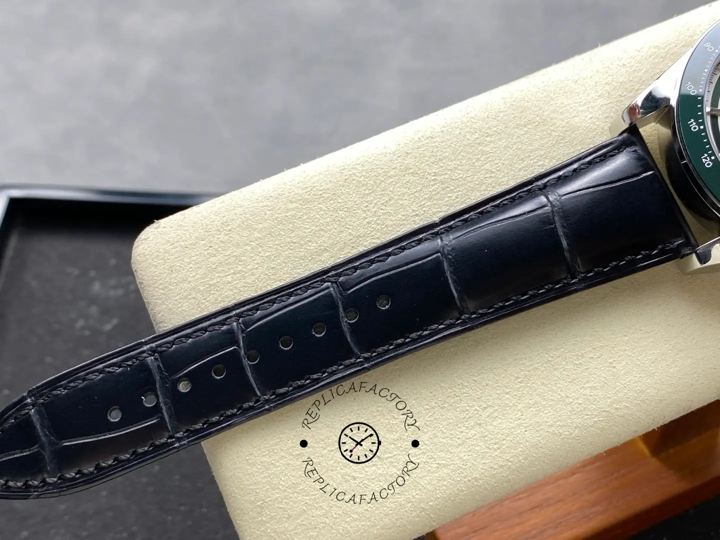 Longines Conquest Chronograph L3.835.4.02.6, black leather strap detail with alligator pattern.