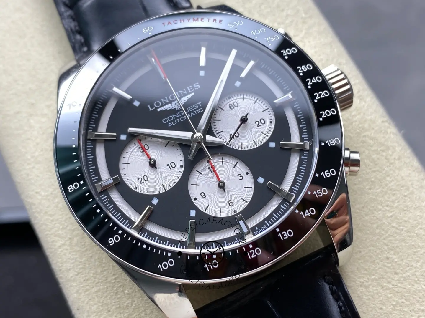 Close-up of Longines Conquest L3.835.4.52.6 black chronograph dial with tachymeter bezel.