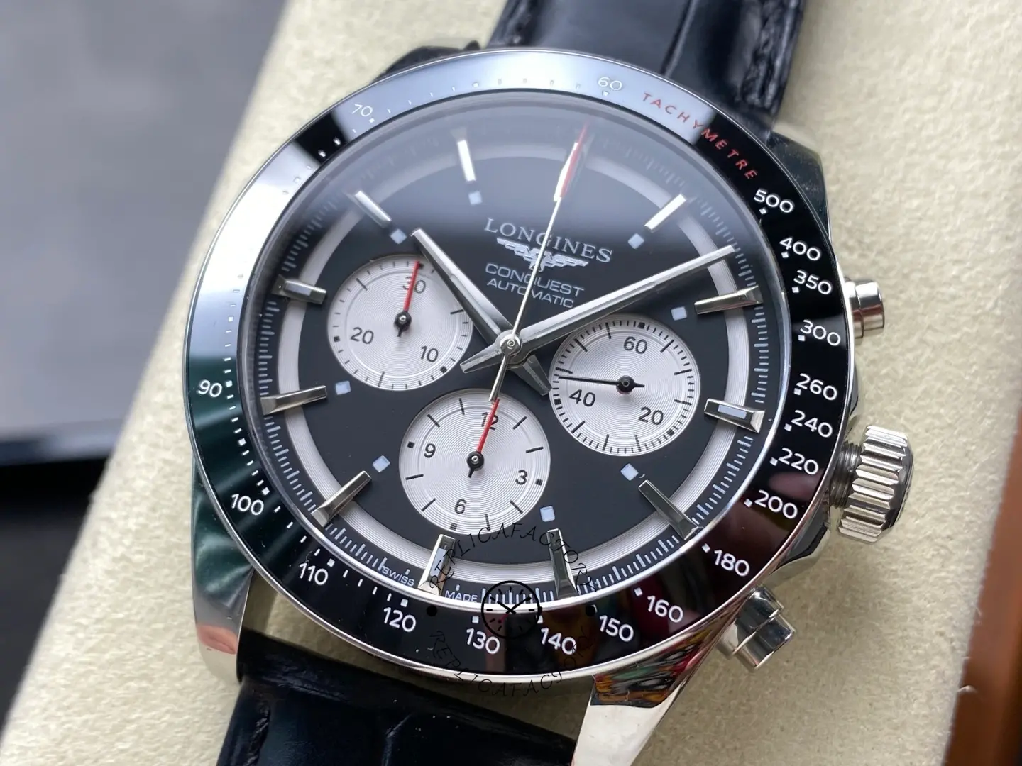 Side angle of Longines Conquest L3.835.4.52.6 showing case curve and sapphire crystal.