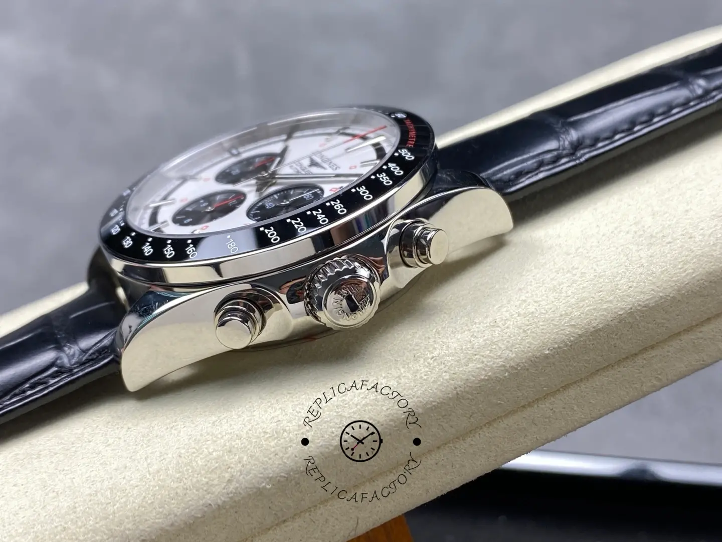 Longines Conquest Chronograph L3.835.4.72.6, crown and pushers close-up on right side of case.