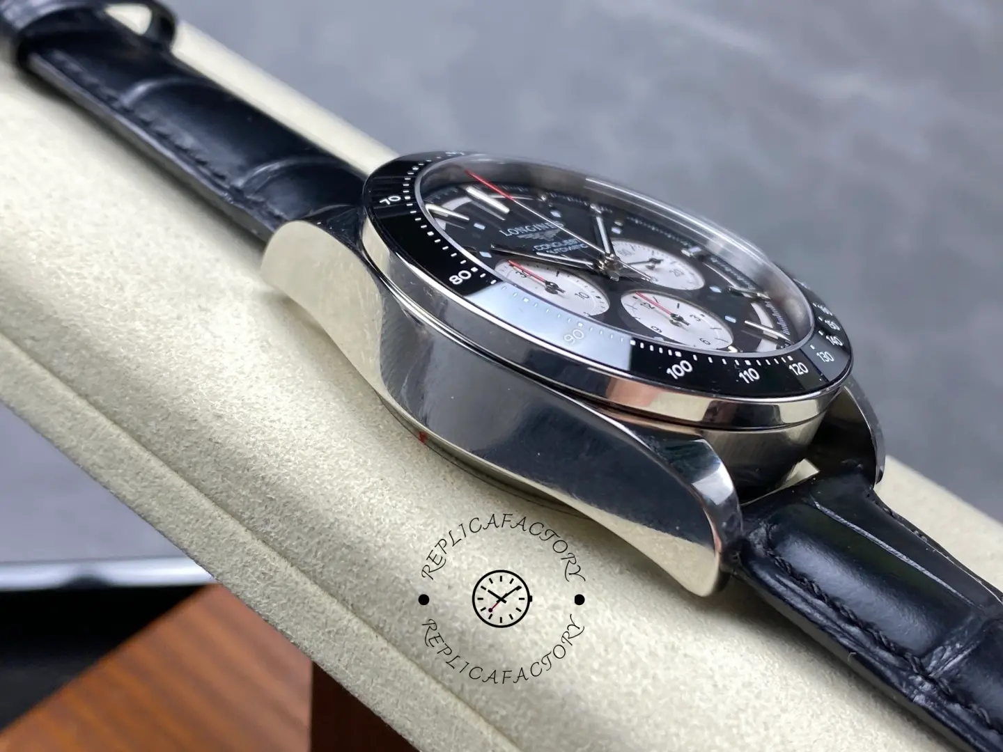 Side profile of Longines Conquest L3.835.4.52.6 showing polished stainless steel case.