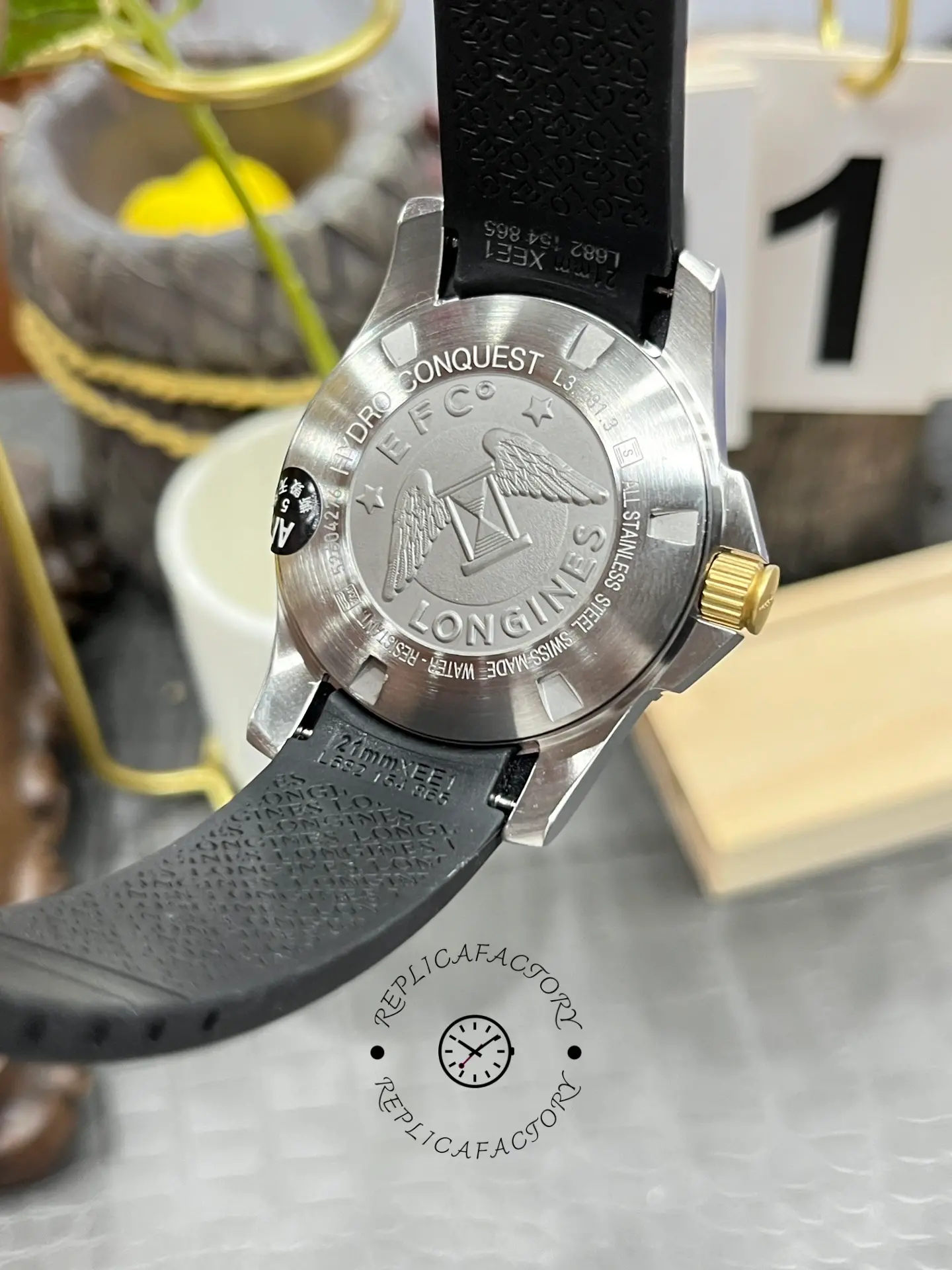 Caseback of Longines HydroConquest L3.781.3.56.9, engraved logo and stainless steel details.