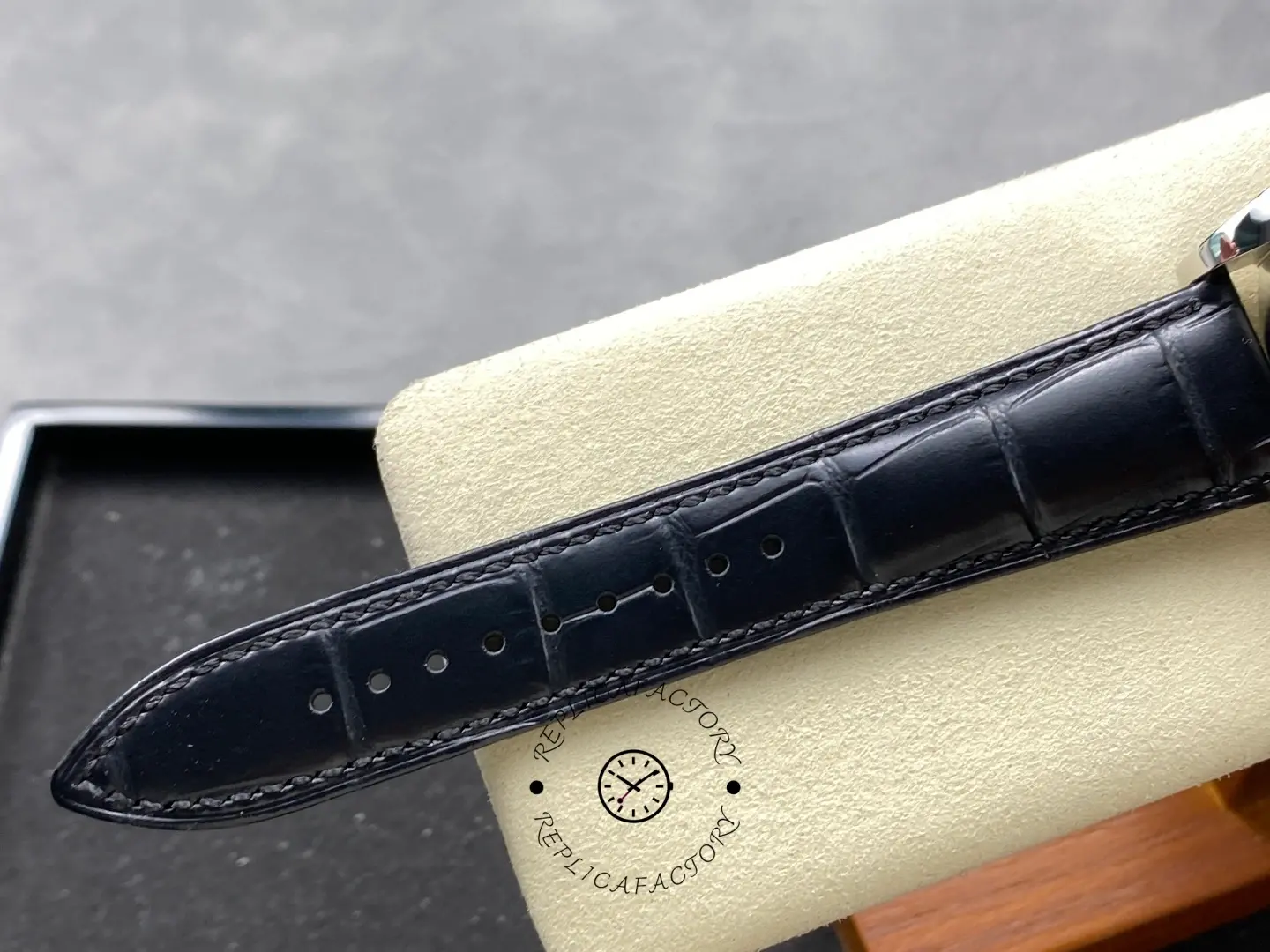 Close-up of the Longines Conquest L3.835.4.92.6 blue leather strap showing detailed stitching.