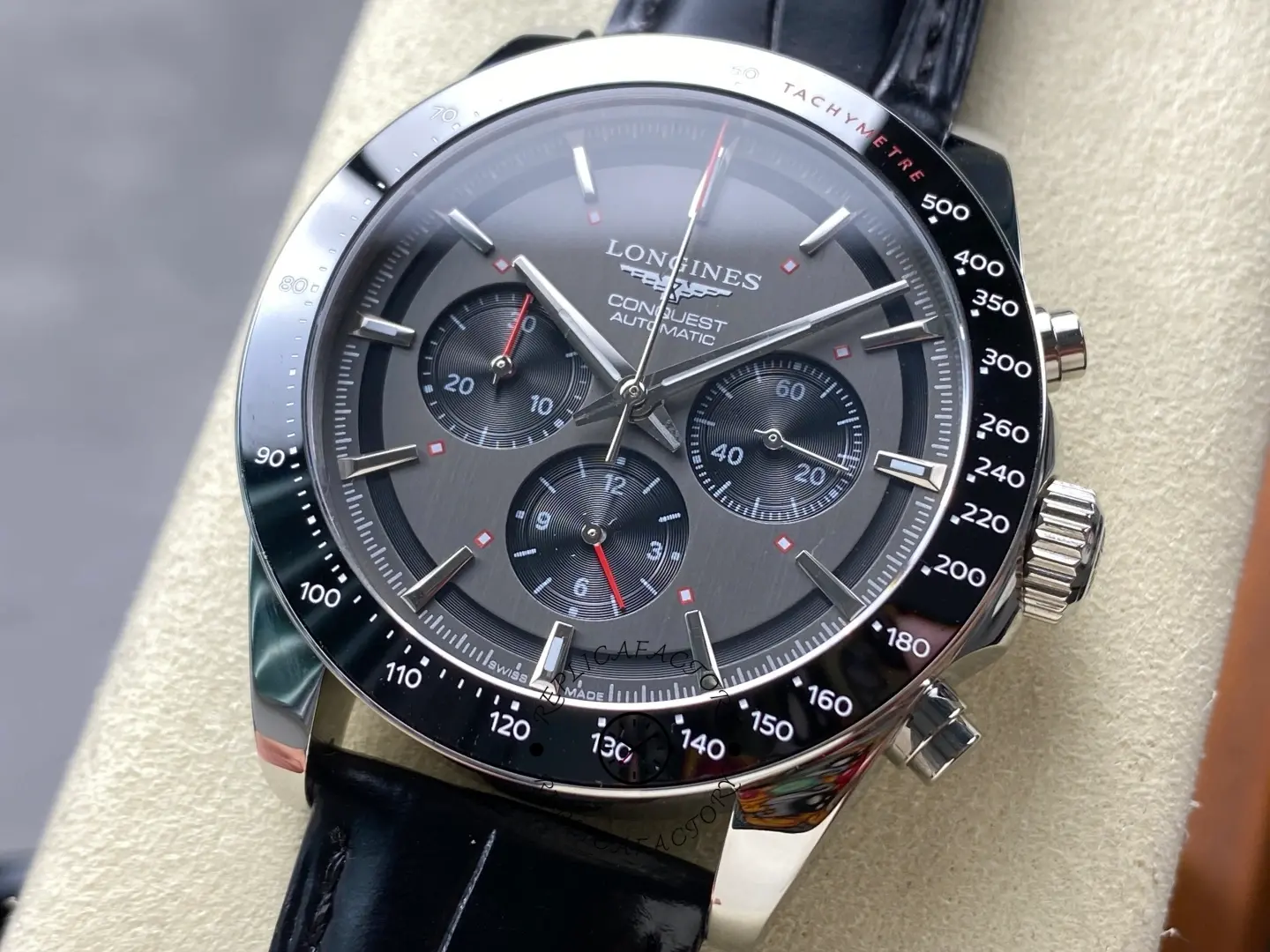 Longines Conquest L3.836.4.52.9 angled view with gray chronograph dial and silver hands.