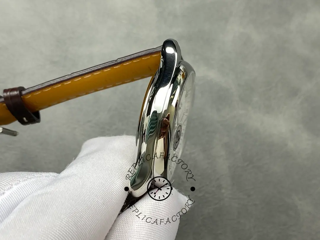 Side view of Longines L2.909.4.77.3 showing polished stainless steel case.