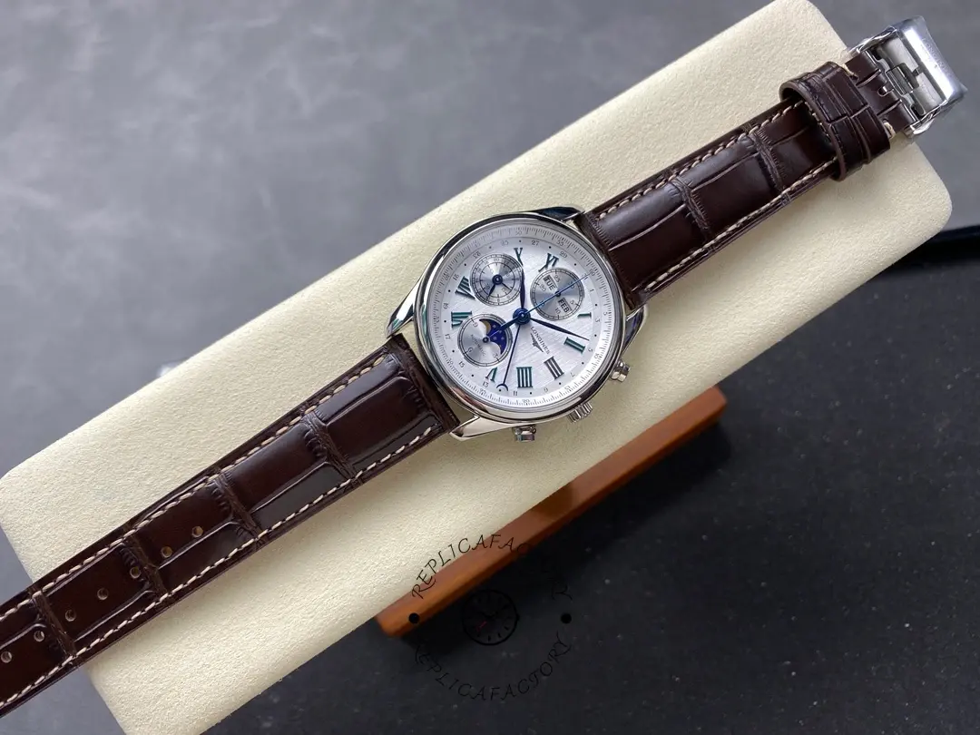 Longines L2.673.4.78.3 full watch view on brown leather strap, silver dial with moonphase and subdials.