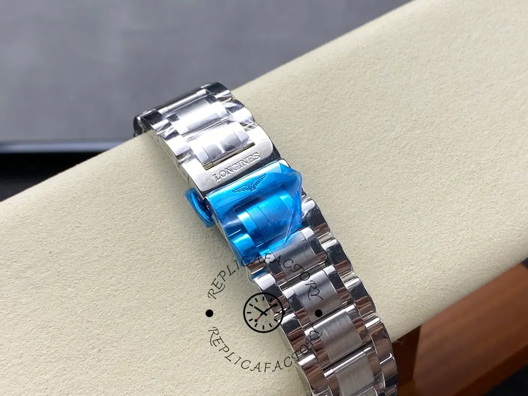 Clasp detail of Longines L2.773.4.71.6, stainless-steel bracelet with blue protective film.
