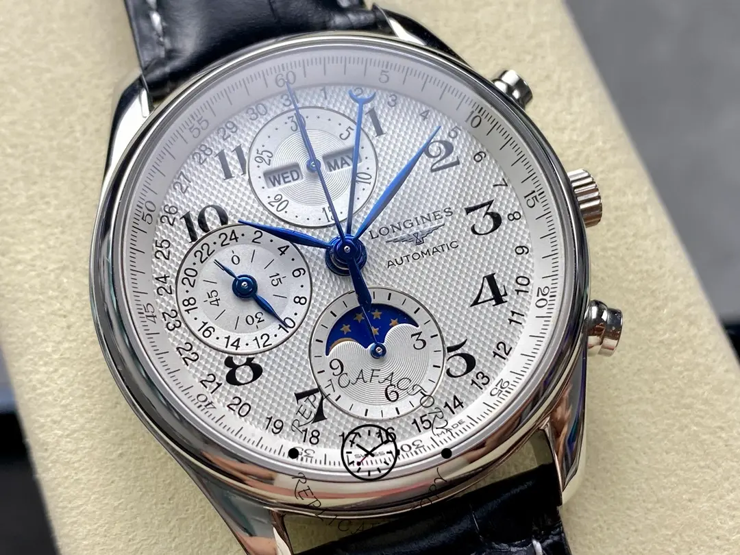 Close-up of Longines L2.673.4.78.3 dial, highlighting blue hands, day/date subdials, and moonphase.