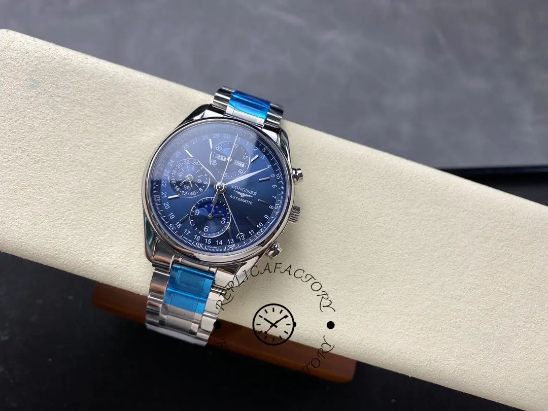 Full view of Longines L2.673.4.92.6 on cushion, blue dial and stainless-steel bracelet.