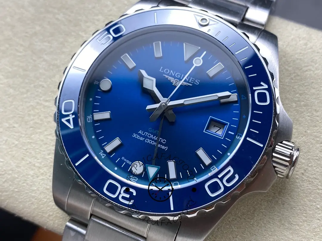 Angled view of Longines HydroConquest GMT L3.790.4.96.6, blue dial and luminous markers.