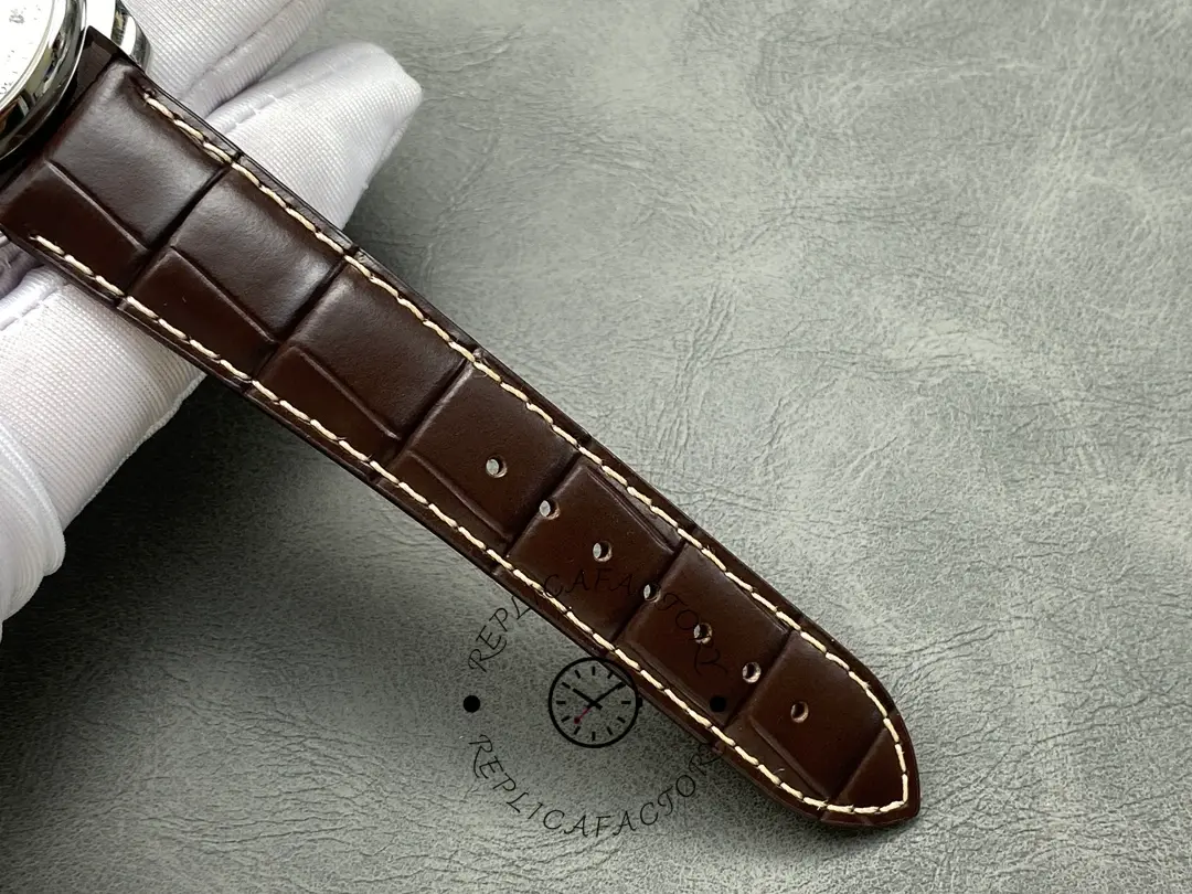 Strap detail of Longines L2.909.4.77.3, brown alligator pattern and stitching.