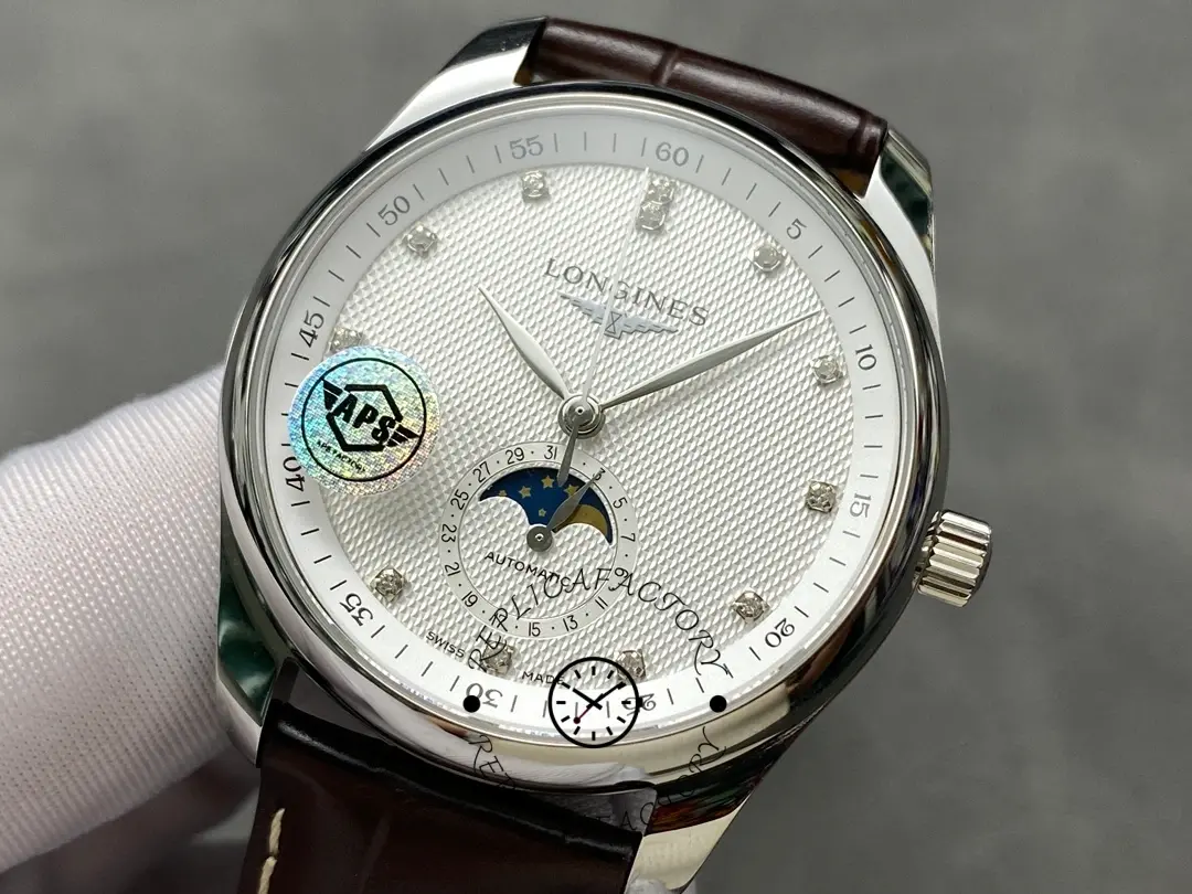 Dial close-up of Longines L2.909.4.77.3 showing moonphase and diamond hour markers.