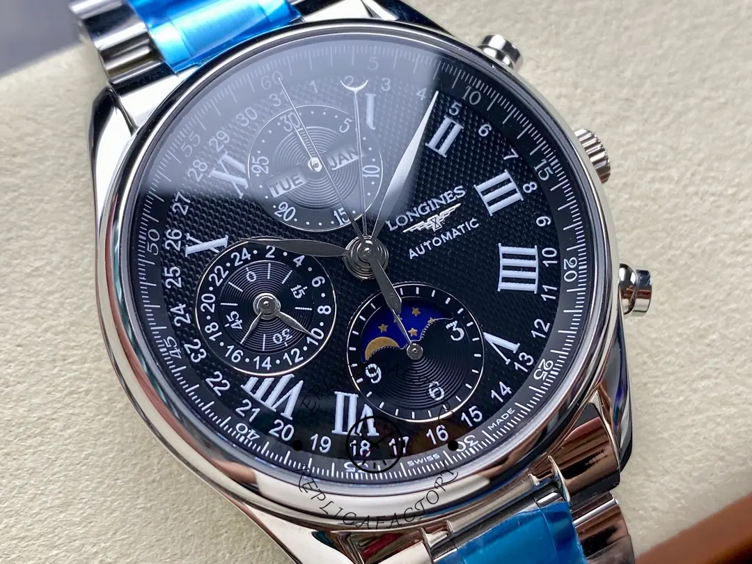 Close-up of Longines Master Collection L2.673.4.51.6 black dial with moonphase and Roman numerals.