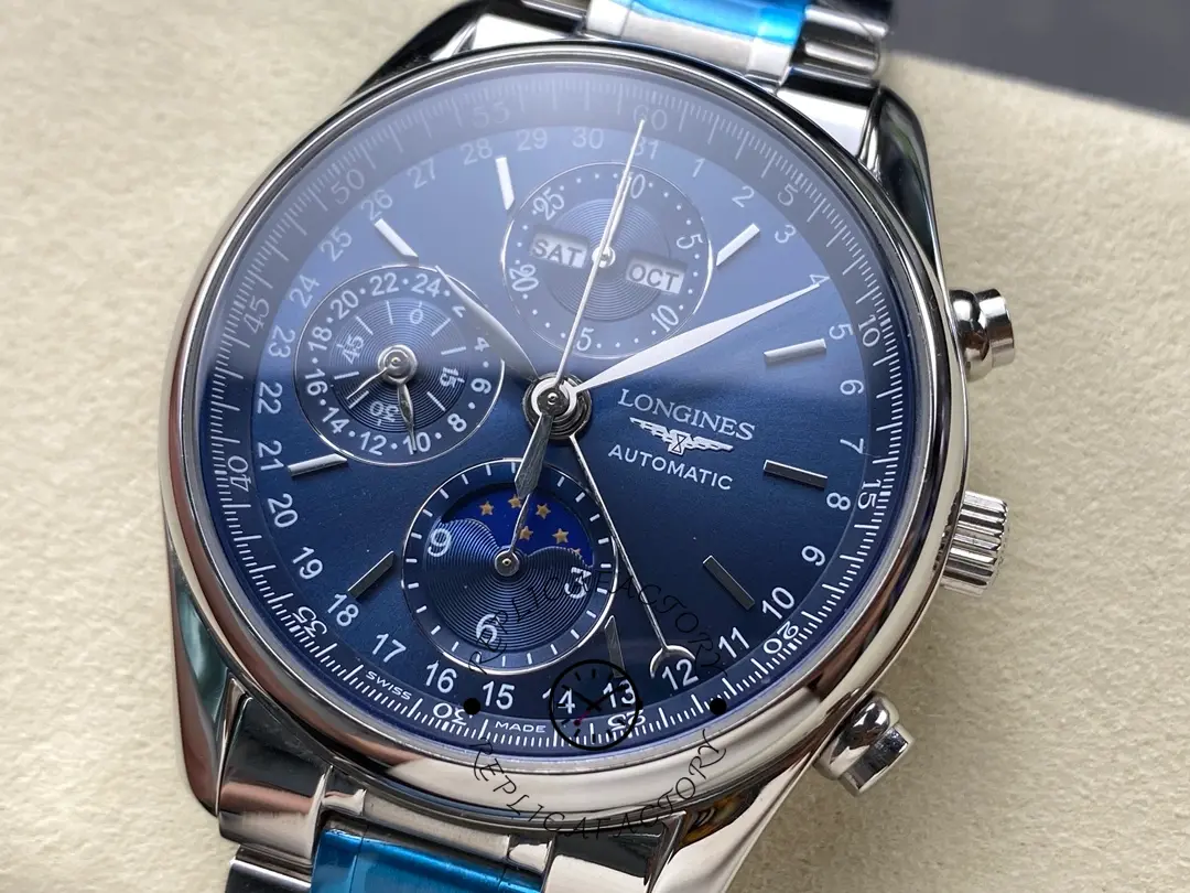 Angled dial view of Longines L2.673.4.92.6 highlighting calendar and moonphase display.