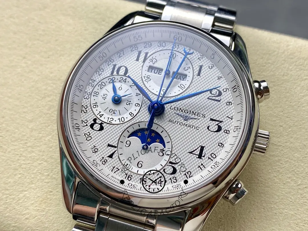Close-up of Longines Master Collection L2.673.4.78.6 dial, blued hands and guilloché texture.