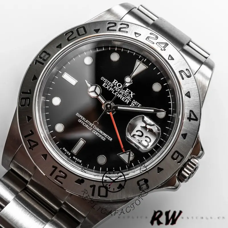 Rolex Explorer II 16570 dial close-up, black dial with red GMT hand, fixed 24-hour bezel.