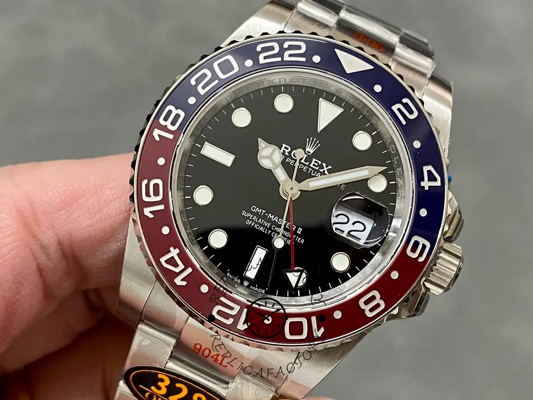 Angled handheld view of the Rolex GMT-Master II 126710BLRO 0002 showing bezel colors and case.