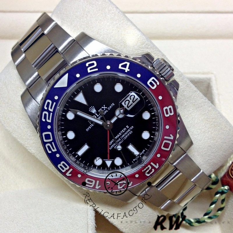 Rolex GMT-Master II 116719BLRO on cushion, black dial and Pepsi bezel, front angle view.