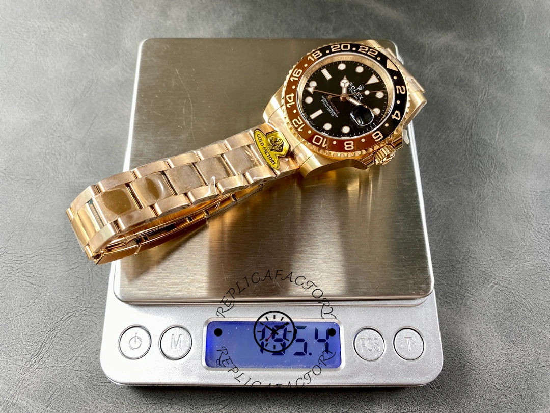Weight scale shot of Rolex GMT-Master II 126715CHNR showing watch weight on digital scale.