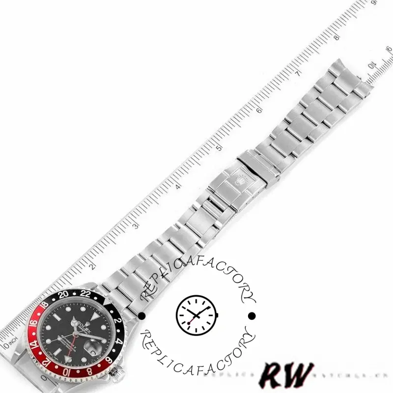 Bracelet measurement view of Rolex GMT-Master II 16710 with steel bracelet on a ruler.