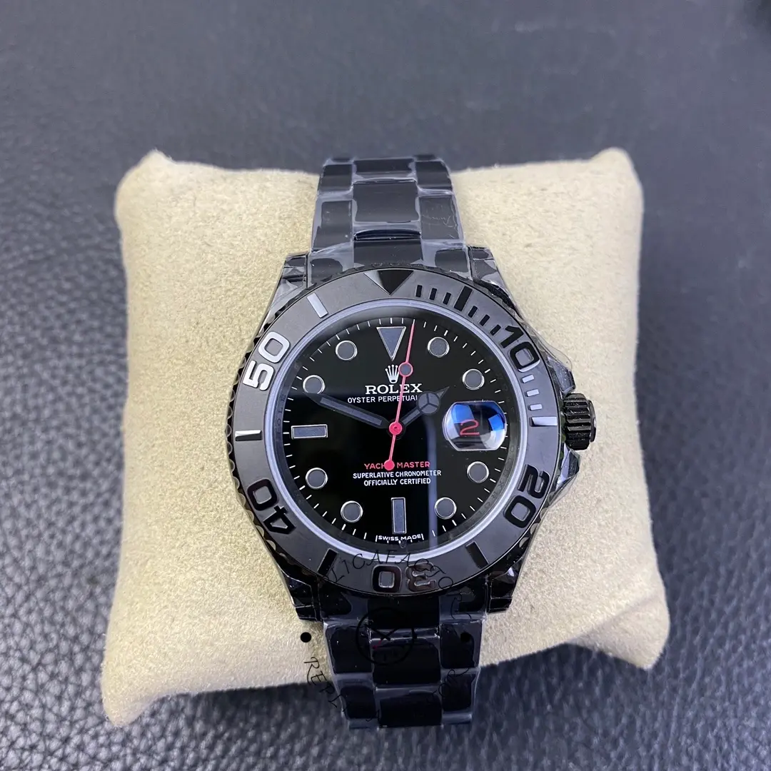 Rolex Yacht-Master 116622, front view on cushion showing black dial and bezel.