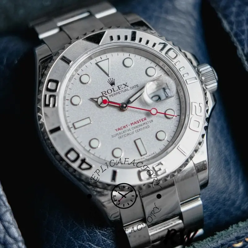 Rolex Yacht-Master 16622 dial close-up, silver dial and bezel numerals, red seconds hand detail.