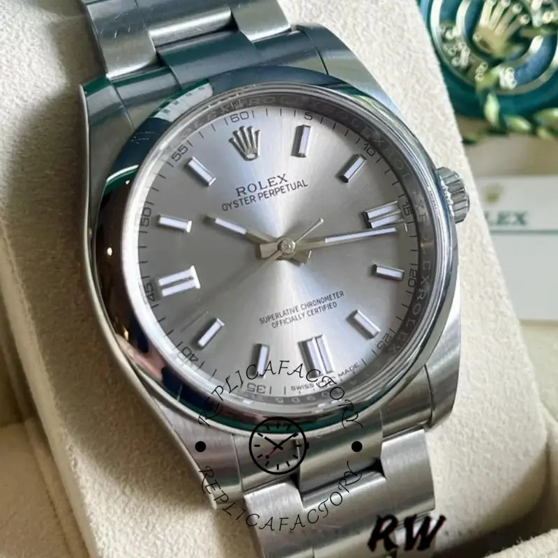 Rolex Oyster Perpetual 116000 close-up, rhodium grey dial and smooth bezel, on cushion.