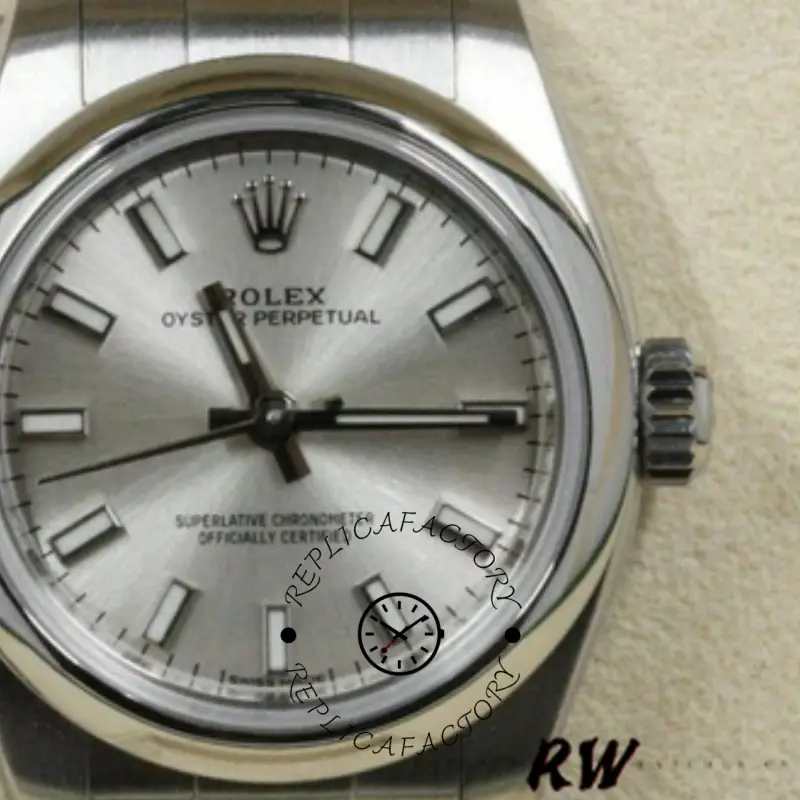 Rolex Oyster Perpetual 176200, dial close-up showing silver index markers and hands, 26mm.