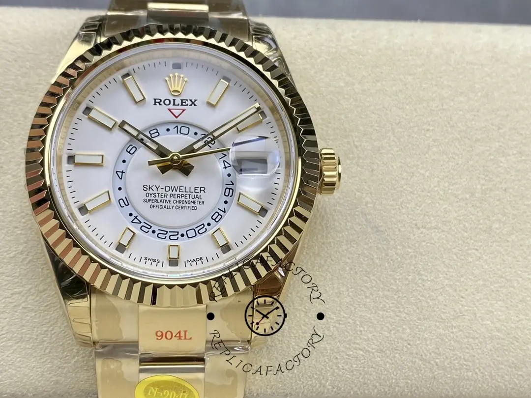 Rolex Sky-Dweller M336938 0003 on pillow, close front view showing white dial and fluted bezel.